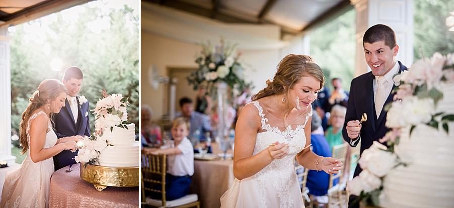 Cutting the cake at this Castleton Farms Wedding by Knoxville Wedding Photographer, Amanda May Photos.