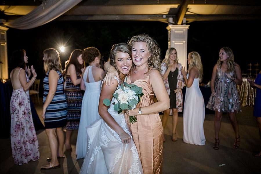Catching the bouquet at this Castleton Farms Wedding by Knoxville Wedding Photographer, Amanda May Photos.