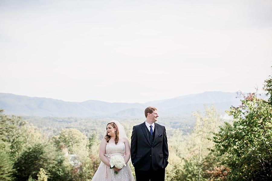 Bride and groom looking away at this Christopher Place wedding by Knoxville Wedding Photographer, Amanda May Photos