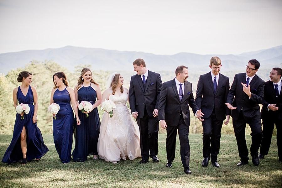 Wedding party walking in front of mountains at this Christopher Place wedding by Knoxville Wedding Photographer, Amanda May Photos