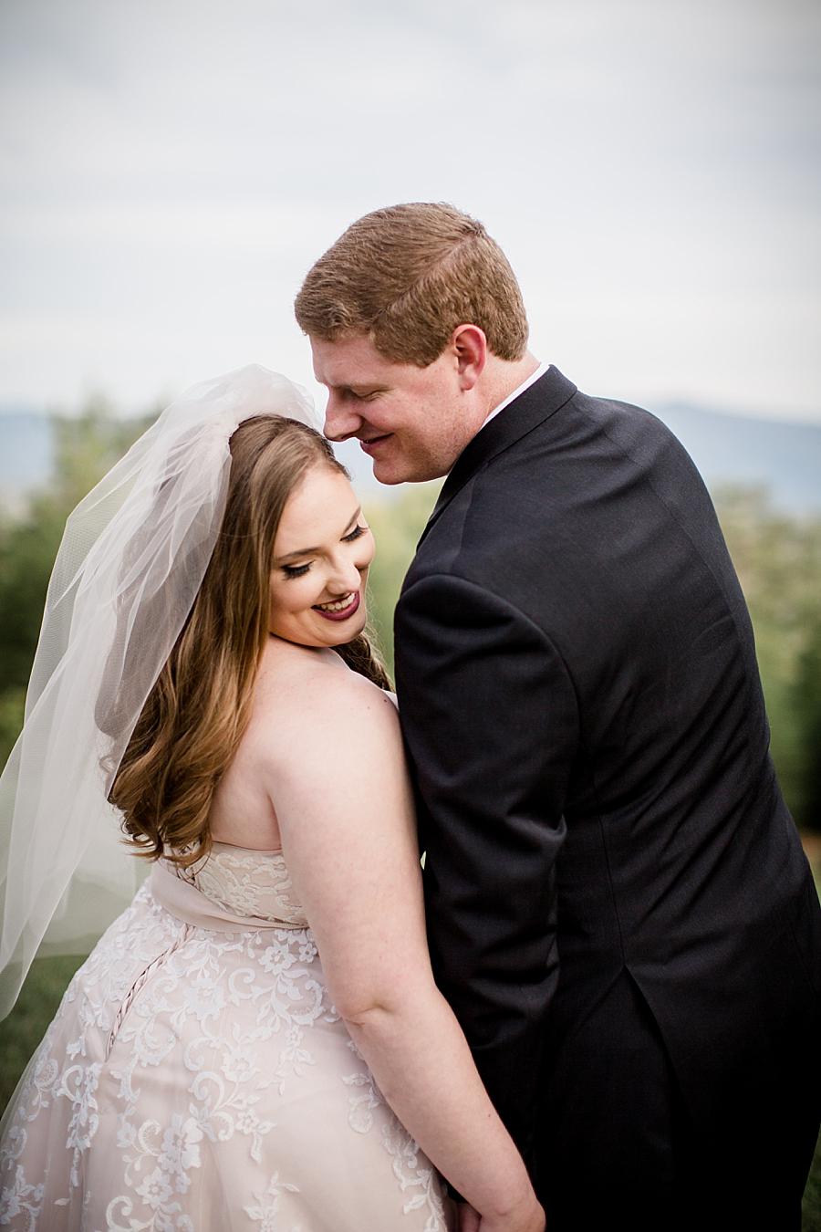 Groom loving his bride at this Christopher Place wedding by Knoxville Wedding Photographer, Amanda May Photos