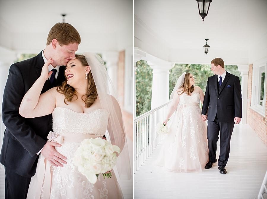 Bride holding her groom at this Christopher Place wedding by Knoxville Wedding Photographer, Amanda May Photos