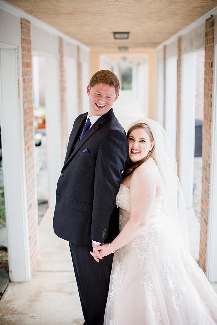 Bride loving on her groom at this Christopher Place wedding by Knoxville Wedding Photographer, Amanda May Photos