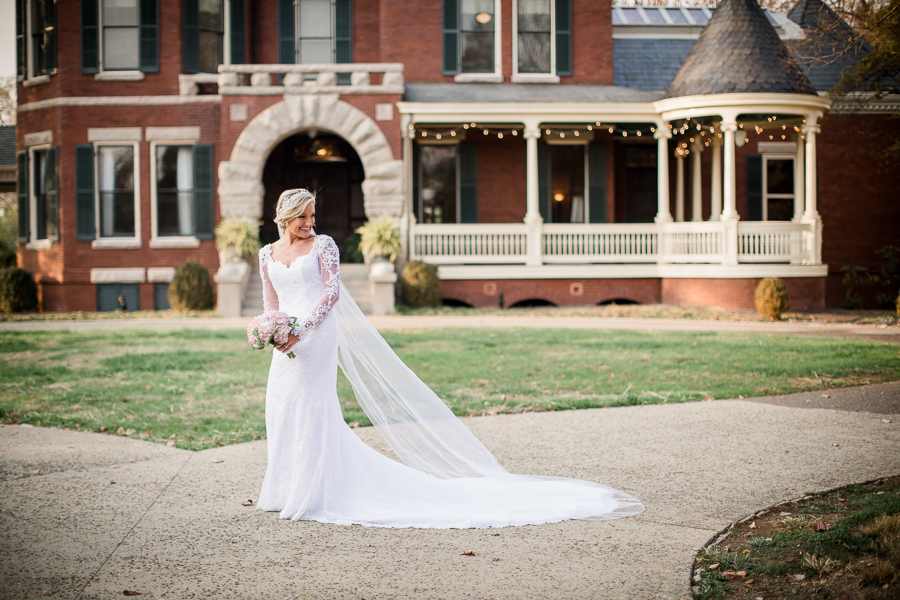 Looking back over her shoulder at Historic Westwood by Knoxville Wedding Photographer, Amanda May Photos.
