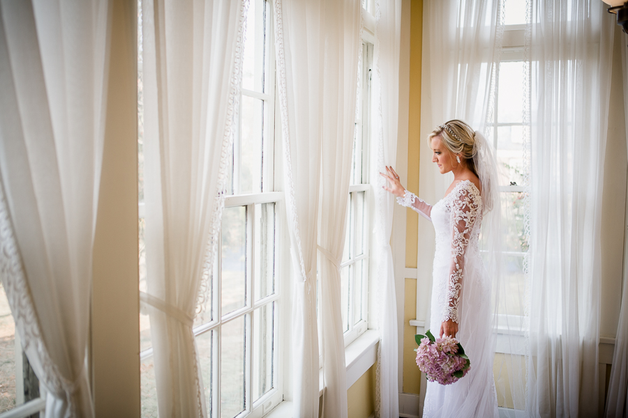 Looking out the window at Historic Westwood by Knoxville Wedding Photographer, Amanda May Photos.