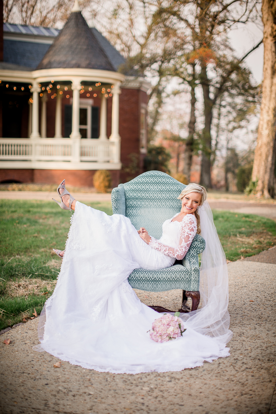 Laughing in blue chair at Historic Westwood by Knoxville Wedding Photographer, Amanda May Photos.