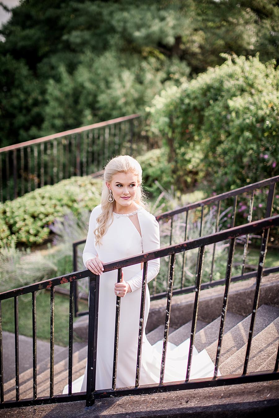 On the stairs at this Crescent Bend Bridal Session by Knoxville Wedding Photographer, Amanda May Photos.