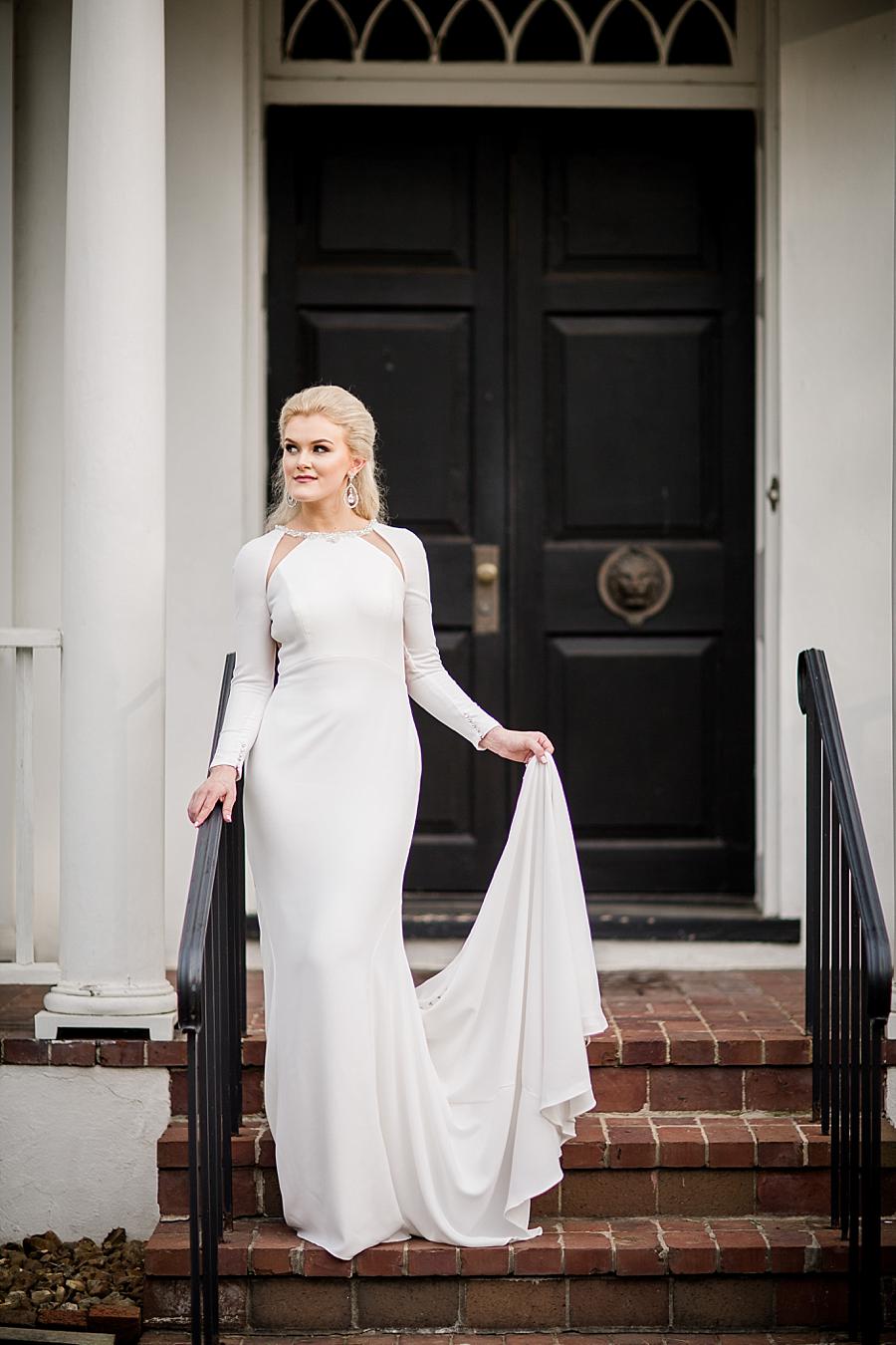 Holding the rail at this Crescent Bend Bridal Session by Knoxville Wedding Photographer, Amanda May Photos.
