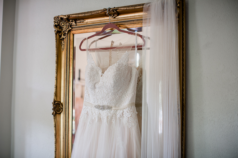 Dress hanging on mirror at this North Carolina Elopement by Knoxville Wedding Photographer, Amanda May Photos.