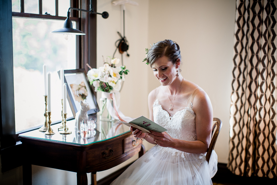 Bride reading letter from Groom at this North Carolina Elopement by Knoxville Wedding Photographer, Amanda May Photos.