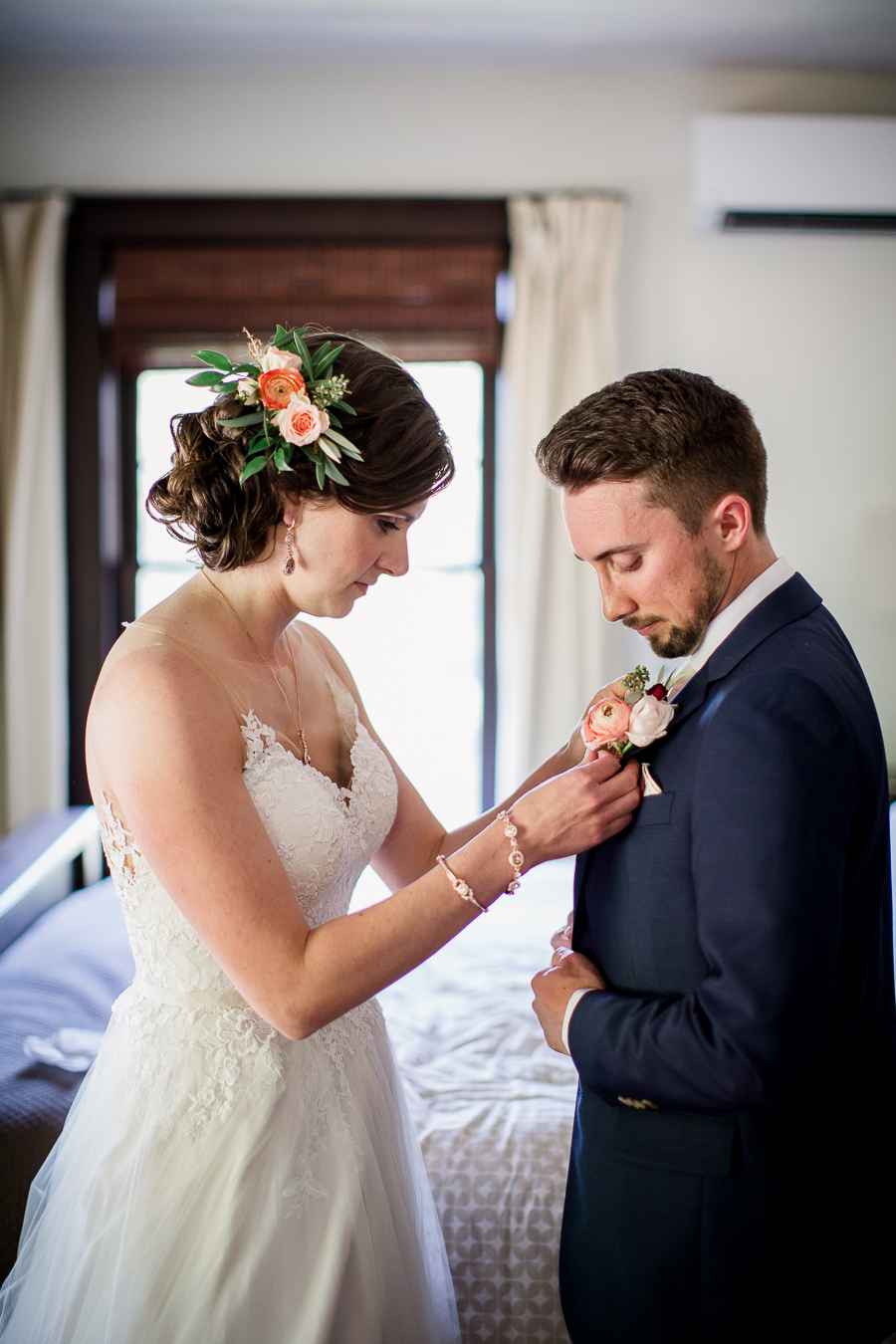 Bride helping Groom with flower at this North Carolina Elopement by Knoxville Wedding Photographer, Amanda May Photos.