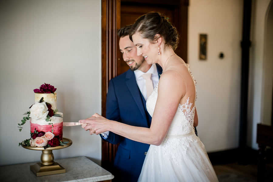 Cutting the cake at this North Carolina Elopement by Knoxville Wedding Photographer, Amanda May Photos.