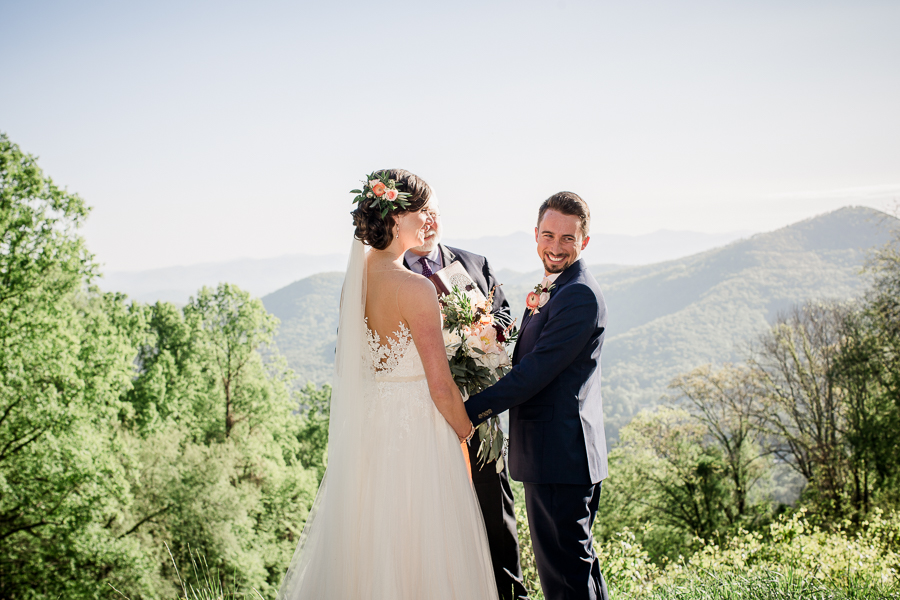 Looking back at the daughter during the ceremony at this North Carolina Elopement by Knoxville Wedding Photographer, Amanda May Photos.