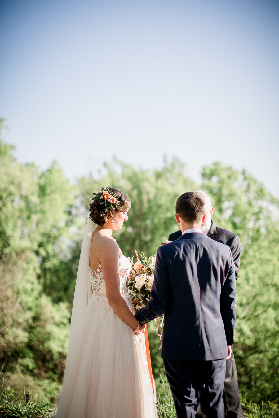 Holding hands at the ceremony at this North Carolina Elopement by Knoxville Wedding Photographer, Amanda May Photos.
