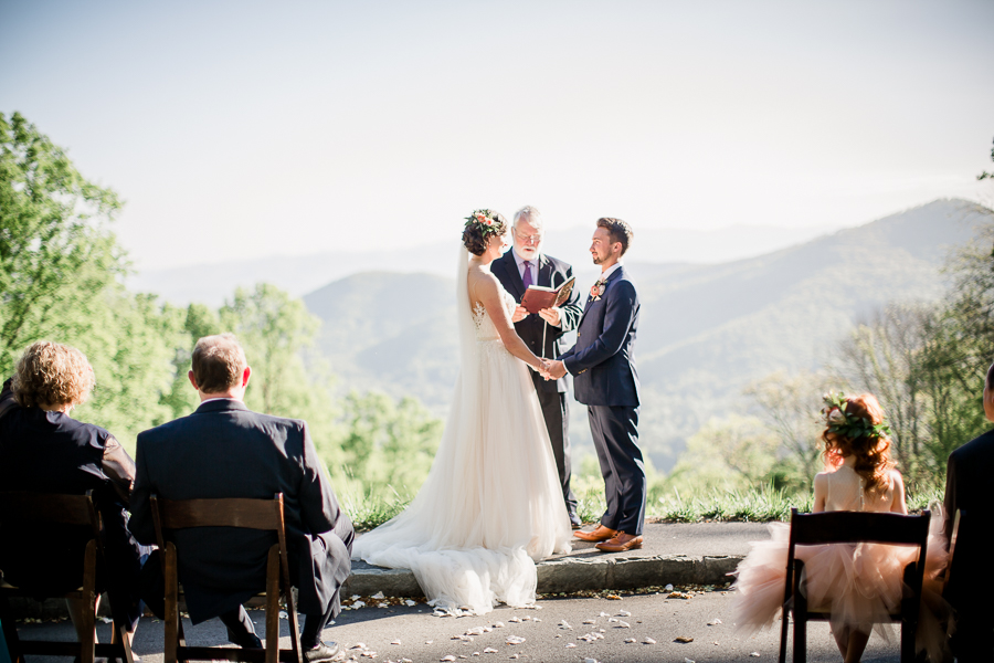 Holding hands during ceremony at this North Carolina Elopement by Knoxville Wedding Photographer, Amanda May Photos.