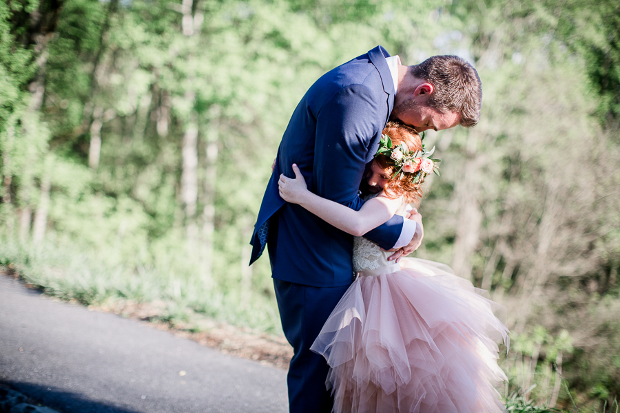 Groom and Flower Girl hugging at this North Carolina Elopement by Knoxville Wedding Photographer, Amanda May Photos.
