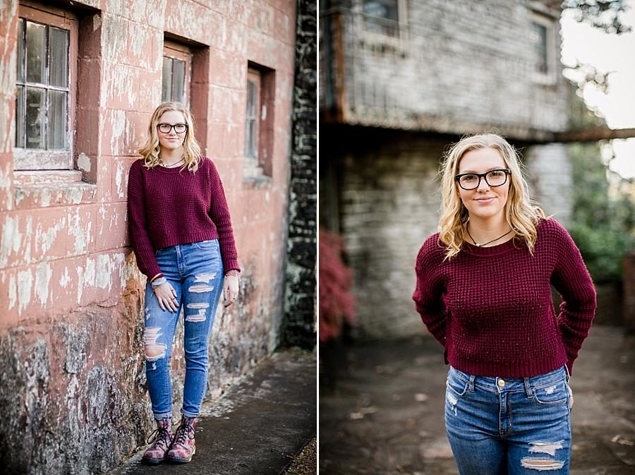 Leaned against a building at this Knoxville Botanical Senior Session by Knoxville Wedding Photographer, Amanda May Photos.