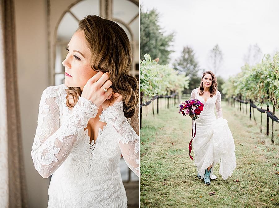 Putting on earrings at this Arrington Vineyard wedding by Knoxville Wedding Photographer, Amanda May Photos.