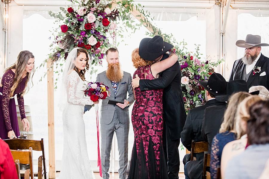 Hug at this Arrington Vineyard wedding by Knoxville Wedding Photographer, Amanda May Photos.