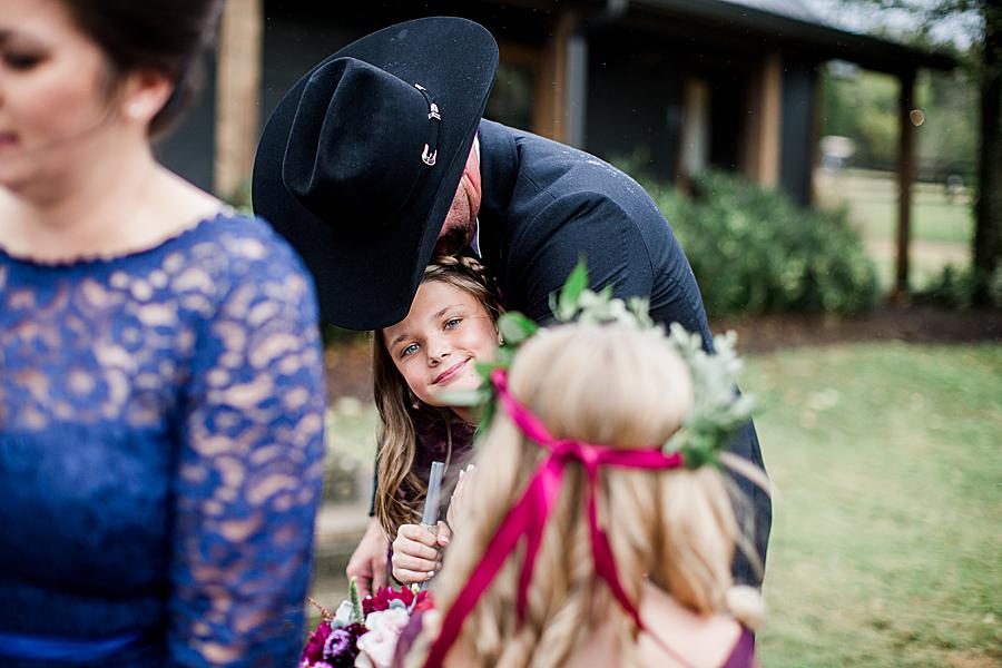 Hugging daughter at this Arrington Vineyard wedding by Knoxville Wedding Photographer, Amanda May Photos.