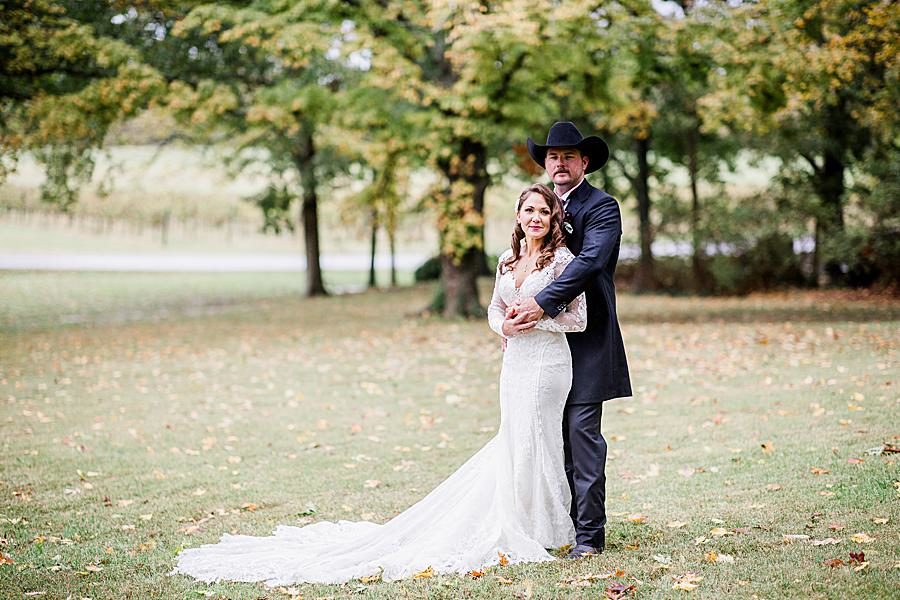 Arms around shoulders at this Arrington Vineyard wedding by Knoxville Wedding Photographer, Amanda May Photos.