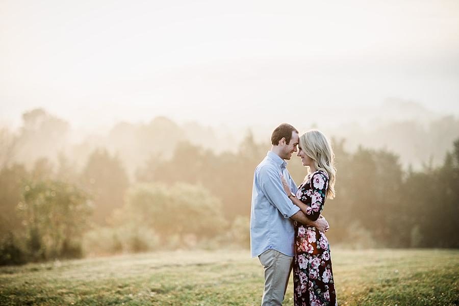 Foreheads together at this Family Farm Engagement Session by Knoxville Wedding Photographer, Amanda May Photos.