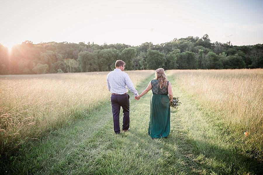 Hand in hand at this Holston River Engagement Session by Knoxville Wedding Photographer, Amanda May Photos.
