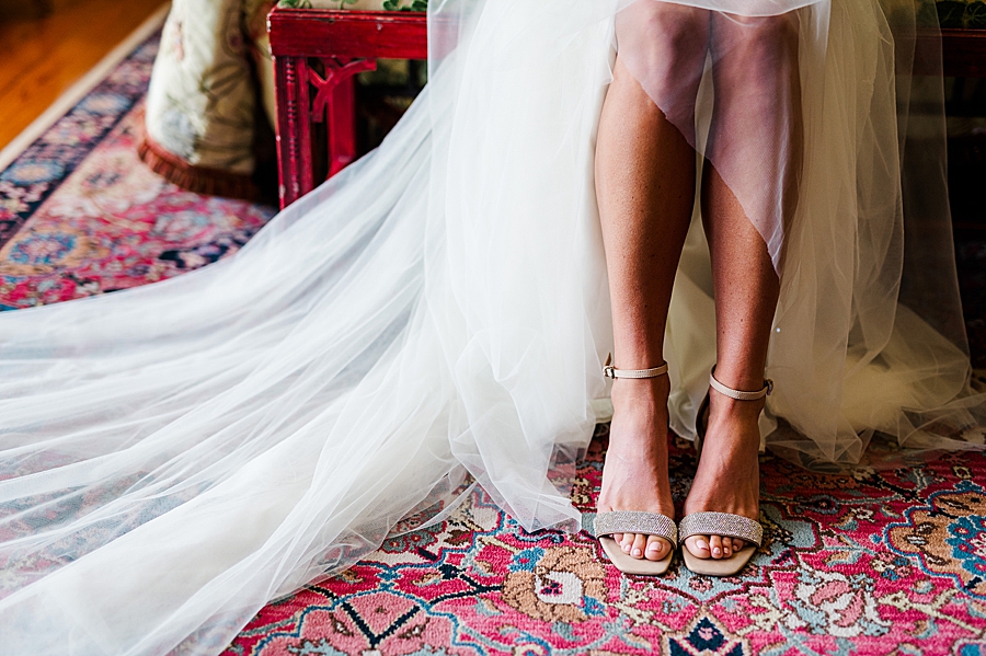 bride's legs at this associate wedding at marblegate
