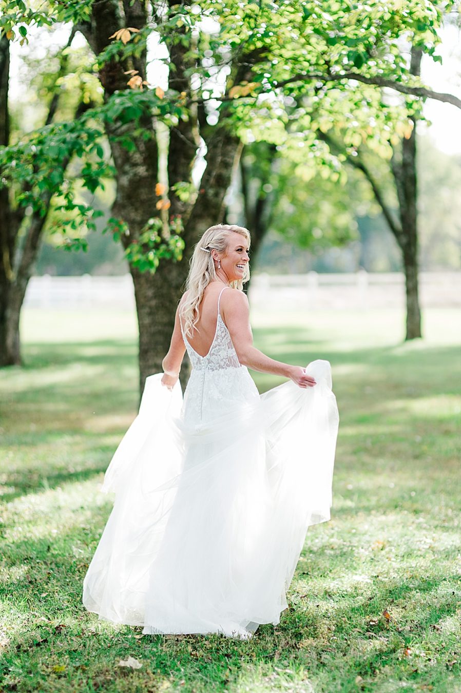 bride twirling at this associate wedding at marblegate