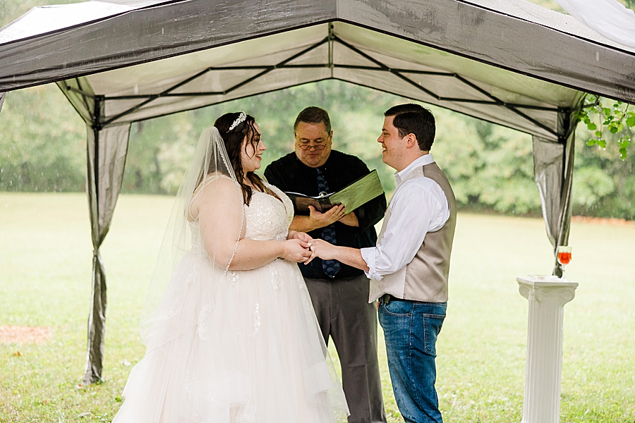 exchanging vows at this backyard wedding