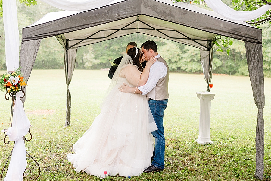 you may kiss the bride at this backyard wedding
