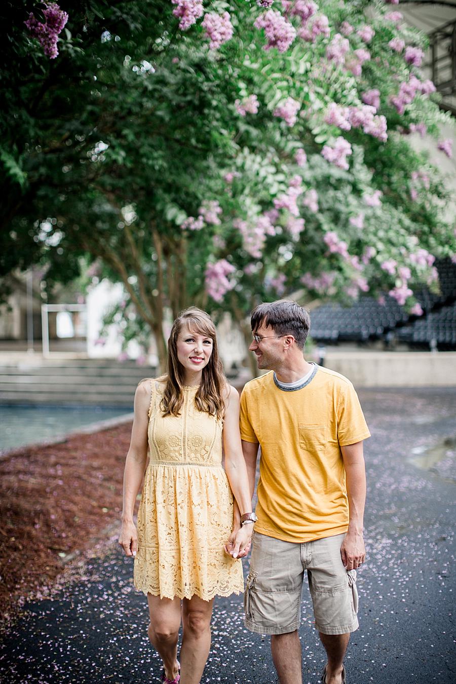 Mom and dad holding hands at this World's Fair Park session by Knoxville Wedding Photographer, Amanda May Photos.