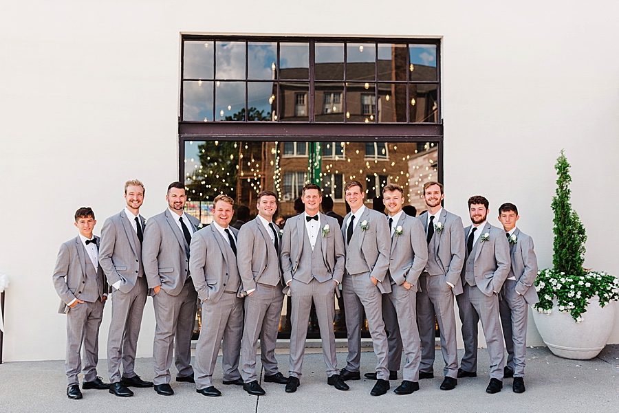 grey tuxedos at this black tie wedding