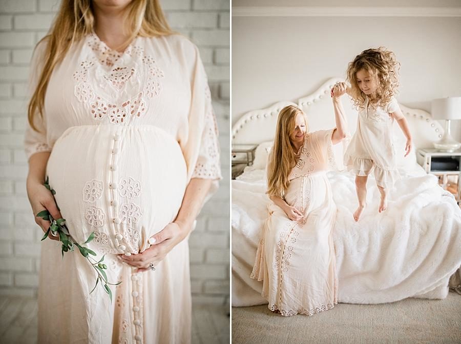 Jumping off the bed at this Lifestyle Maternity Session by Knoxville Wedding Photographer, Amanda May Photos.