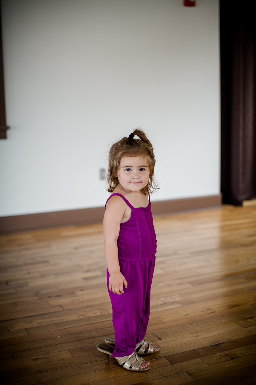 Little girl wearing heels at this wedding at The Standard by Knoxville Wedding Photographer, Amanda May Photos.