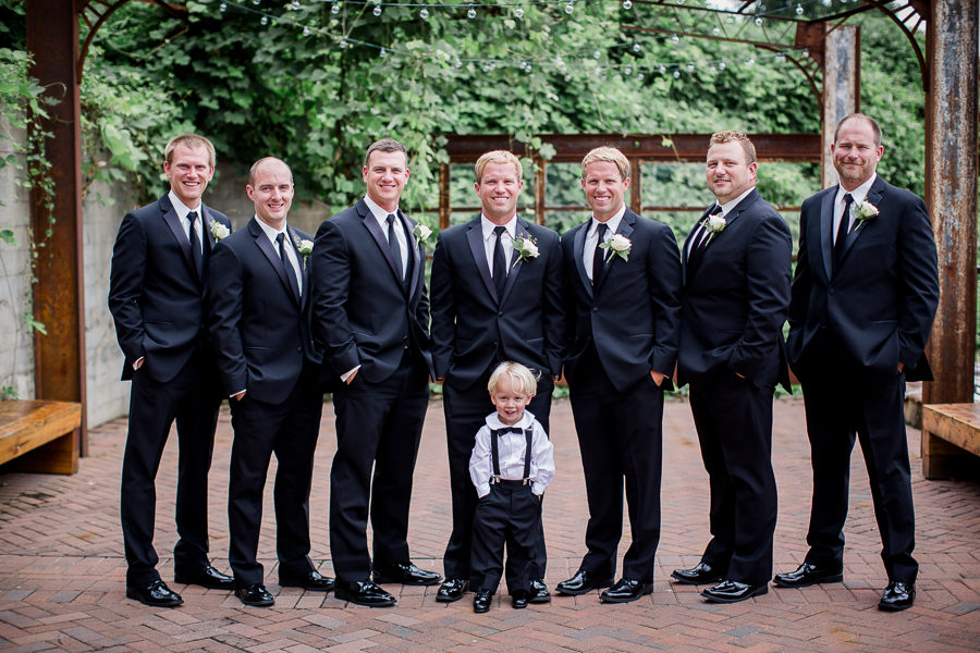 Groom with groomsmen and ring bear at this wedding at The Standard by Knoxville Wedding Photographer, Amanda May Photos.