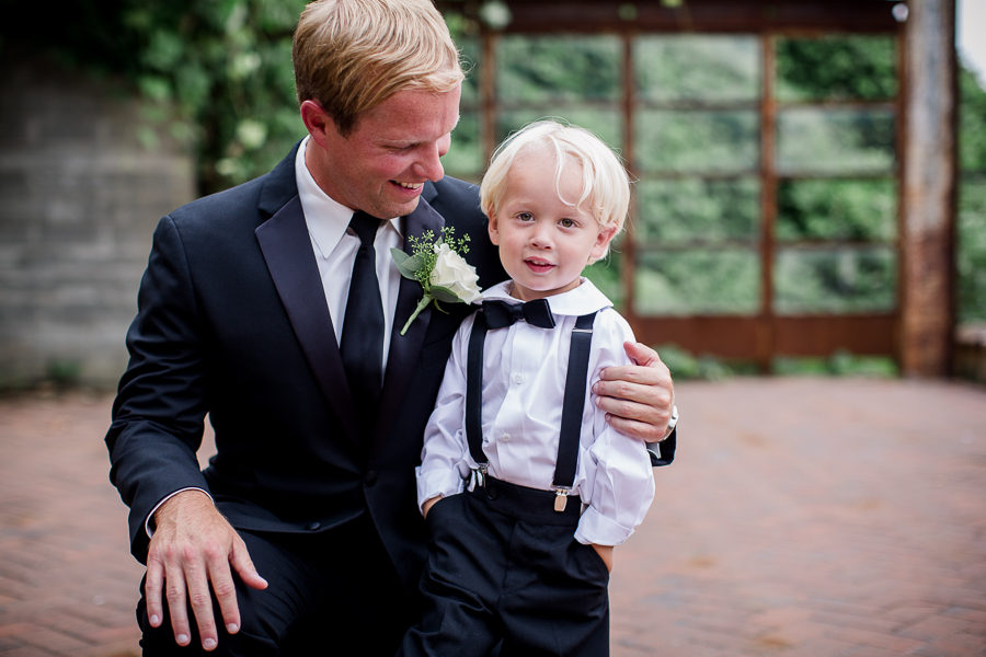 Groom with nephew at this wedding at The Standard by Knoxville Wedding Photographer, Amanda May Photos.