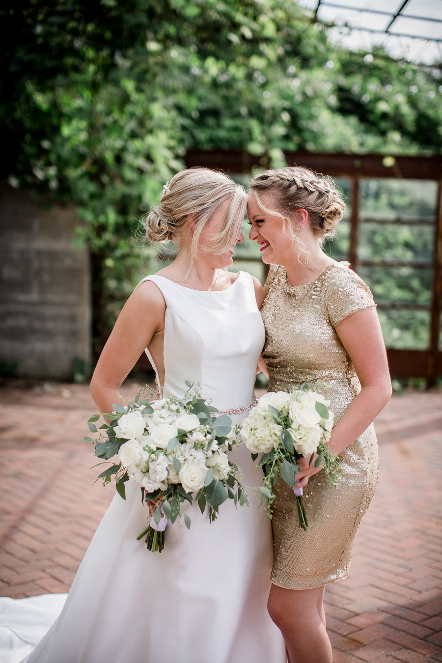 Bride with maid of honor at this wedding at The Standard by Knoxville Wedding Photographer, Amanda May Photos.