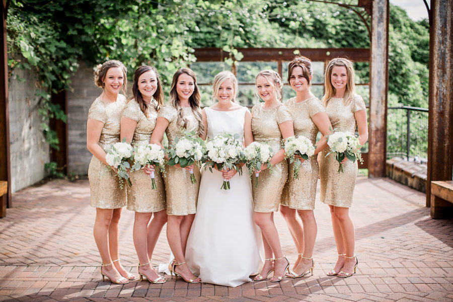 Bride with bridesmaids at this wedding at The Standard by Knoxville Wedding Photographer, Amanda May Photos.