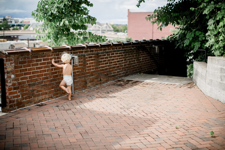 Little boy on roof top at this wedding at The Standard by Knoxville Wedding Photographer, Amanda May Photos.