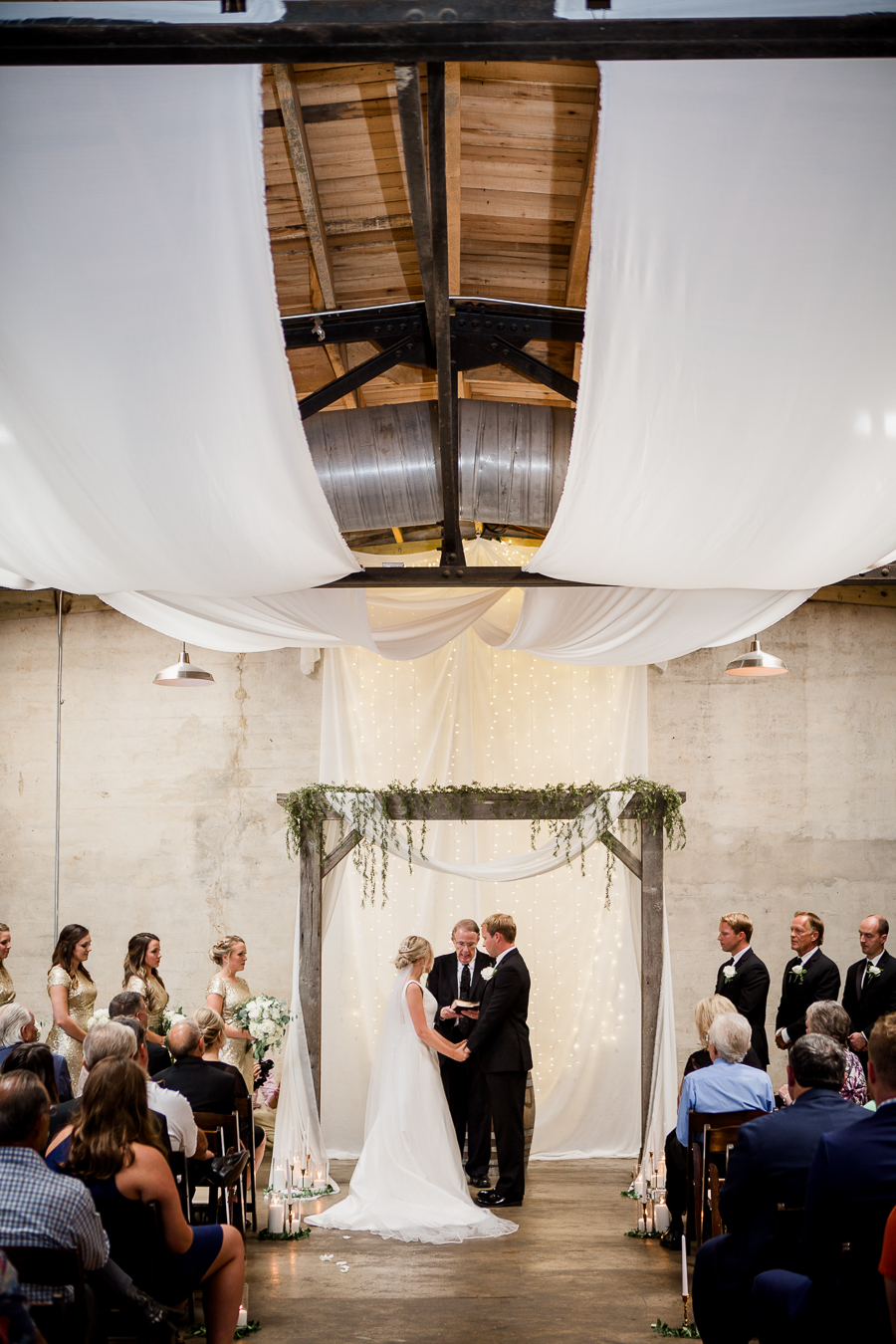 Wide vertical of ceremony at this wedding at The Standard by Knoxville Wedding Photographer, Amanda May Photos.