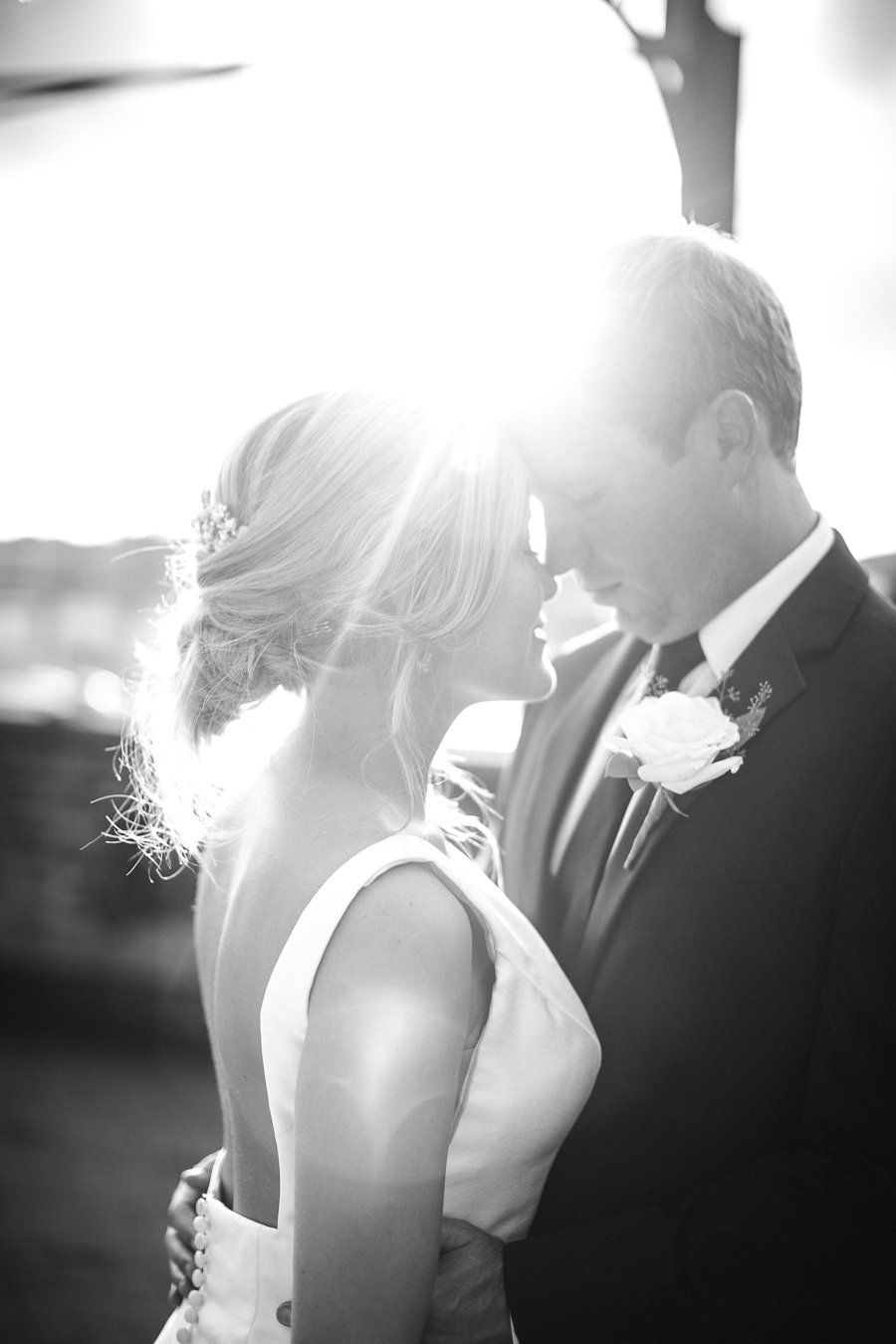 Black and white kissing at this wedding at The Standard by Knoxville Wedding Photographer, Amanda May Photos.