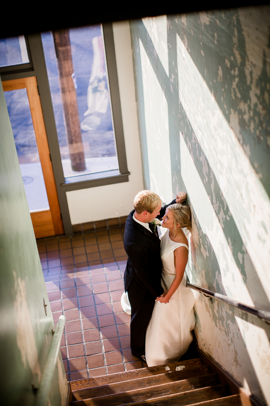 Looking down stairwell at this wedding at The Standard by Knoxville Wedding Photographer, Amanda May Photos.