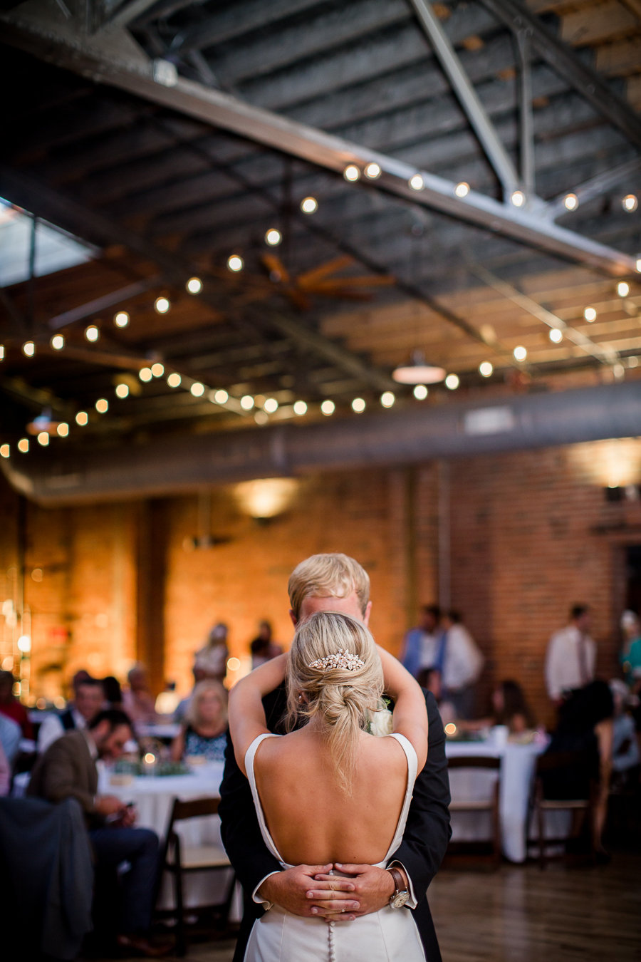 Back view while dancing at this wedding at The Standard by Knoxville Wedding Photographer, Amanda May Photos.