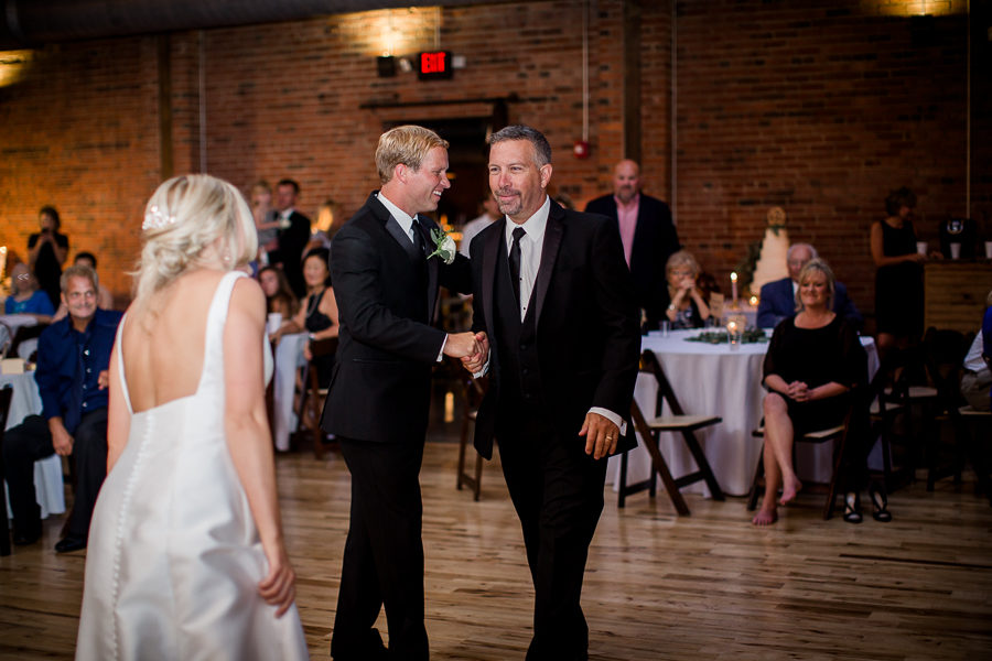 Father of bride shaking hands with groom at this wedding at The Standard by Knoxville Wedding Photographer, Amanda May Photos.