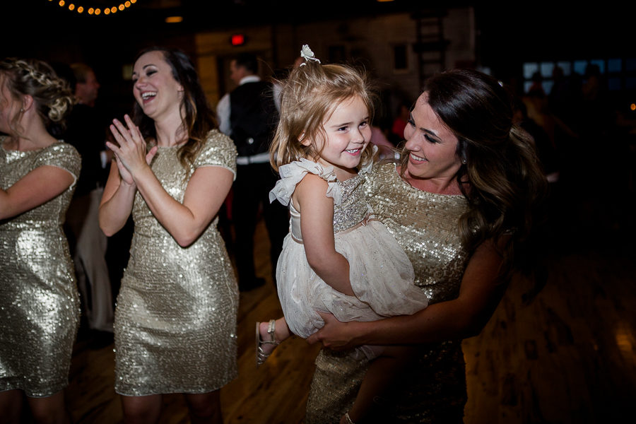 Bridesmaids with flower girl at this wedding at The Standard by Knoxville Wedding Photographer, Amanda May Photos.