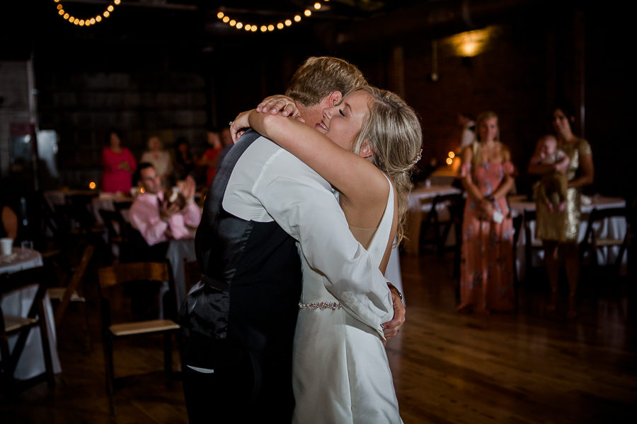 Hugging each other dancing at this wedding at The Standard by Knoxville Wedding Photographer, Amanda May Photos.