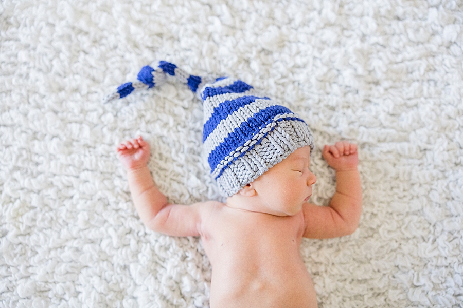 baby in a hat at this bright newborn session