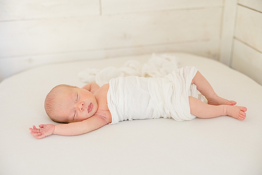 sprawled out baby at this bright newborn session