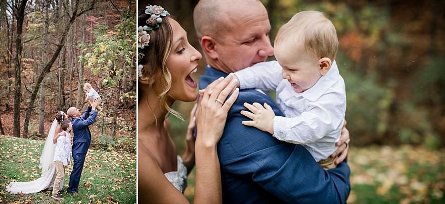 Wedding pictures holding baby at this Alpine Village Wedding Chapel by Knoxville Wedding Photographer, Amanda May Photos.